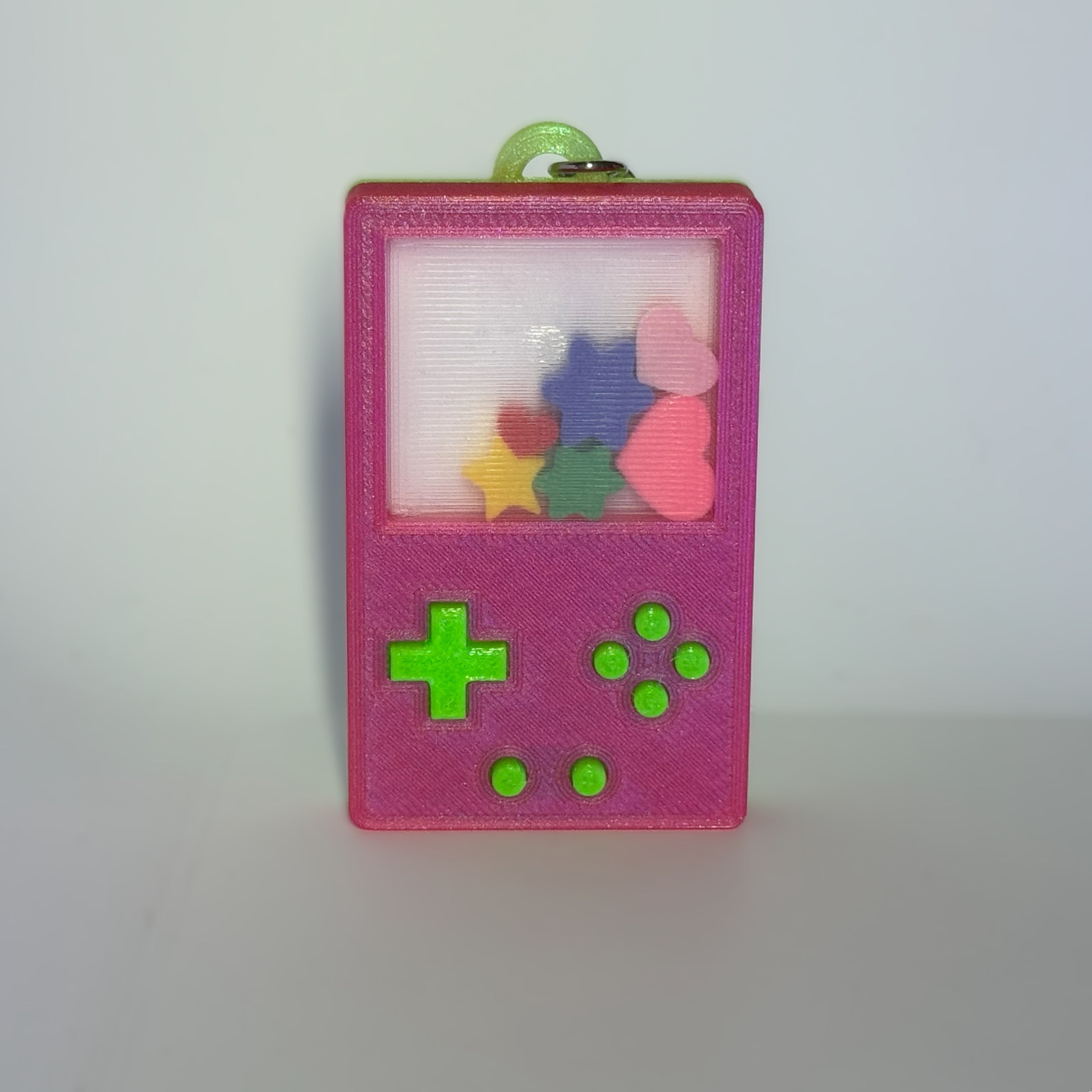Load video: Video of our custom ShakeBit Color Keychain